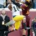 Michigan wide receiver Jeremy Gallon receives a touchdown pass in the end zone over Minnesota defensive back Derrick Wells in the third quarter against Minnesota at TCF Bank Stadium in Minneapolis, Minn. on Saturday. Melanie Maxwell I AnnArbor.com